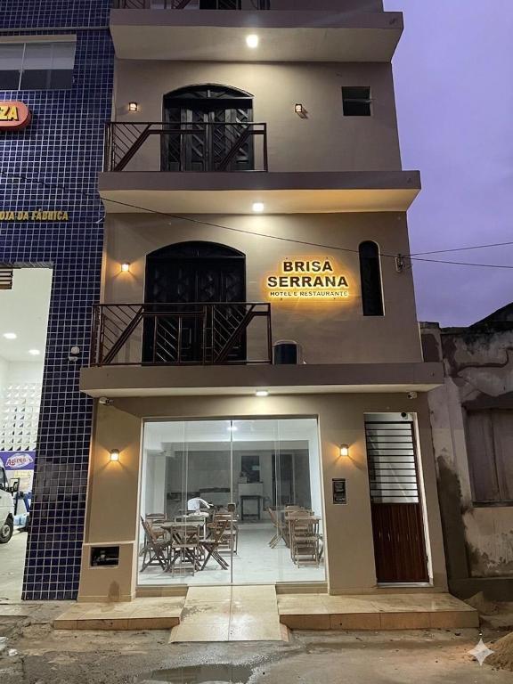a building with a sign that reads bicheno germanica at Hotel Brisa Serrana no Centro de Serrinha in Serrinha