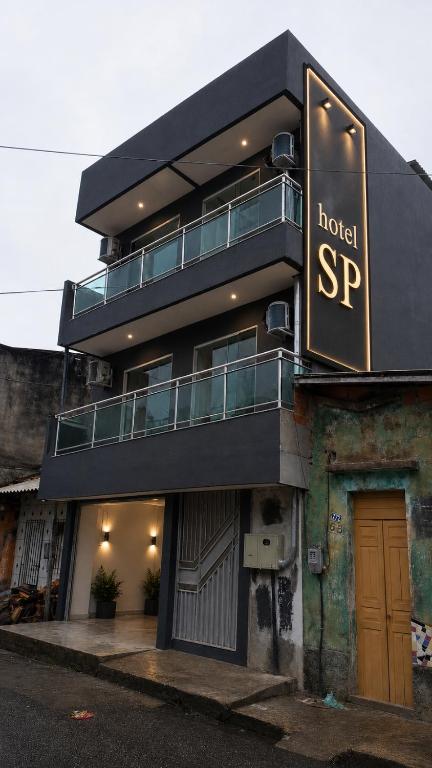 a building with a hotel sp sign on it at Hotel SP in Belém