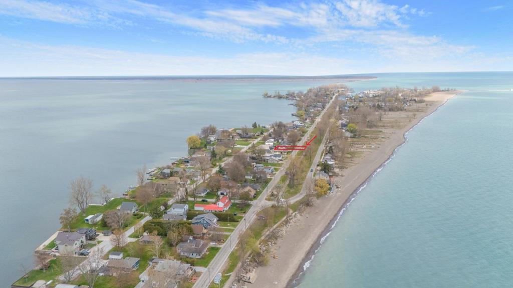 an aerial view of an island in the water at "At the Eau" - Charming 2 Bedroom Cottage! in Erieau