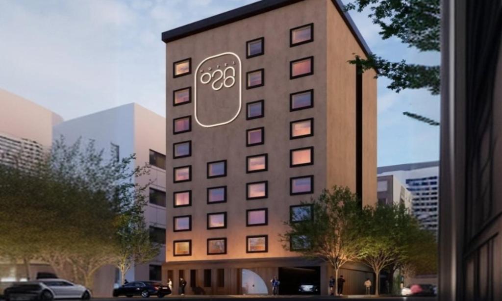 a building with an audi sign on the side of it at Jamsil Orosie Hotel in Seoul
