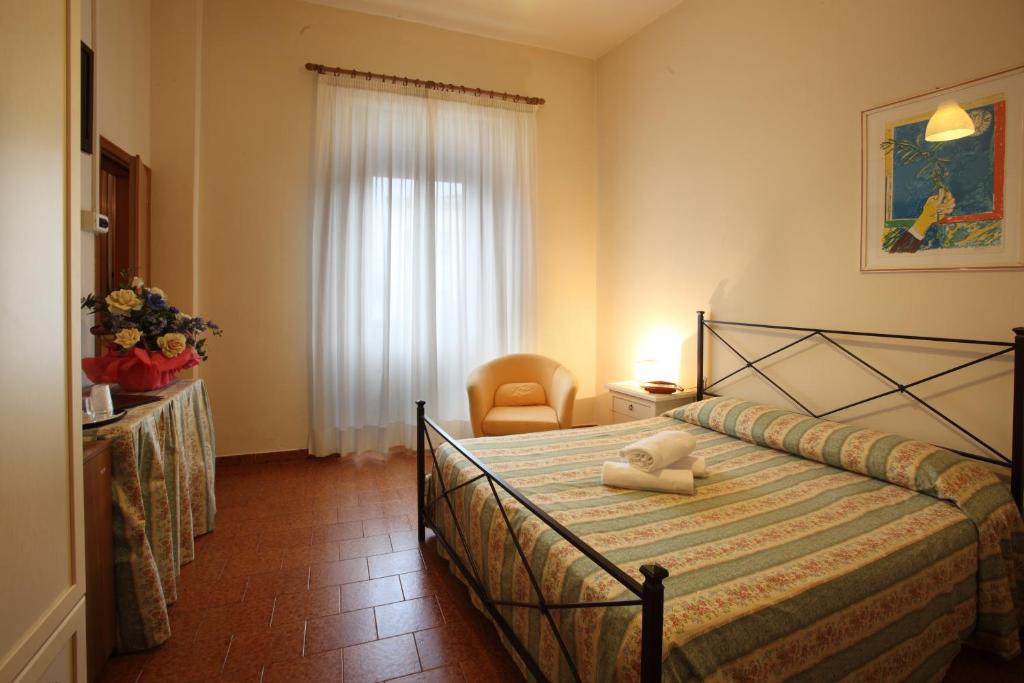Postel nebo postele na pokoji v ubytování Hotel PRime