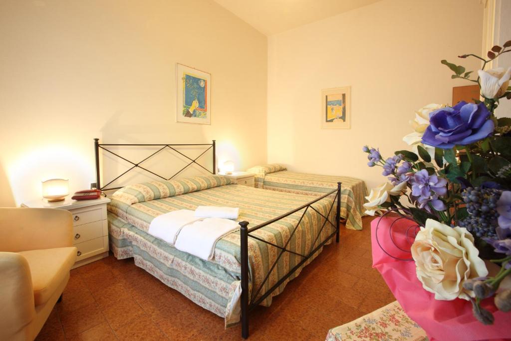Postel nebo postele na pokoji v ubytování Hotel PRime