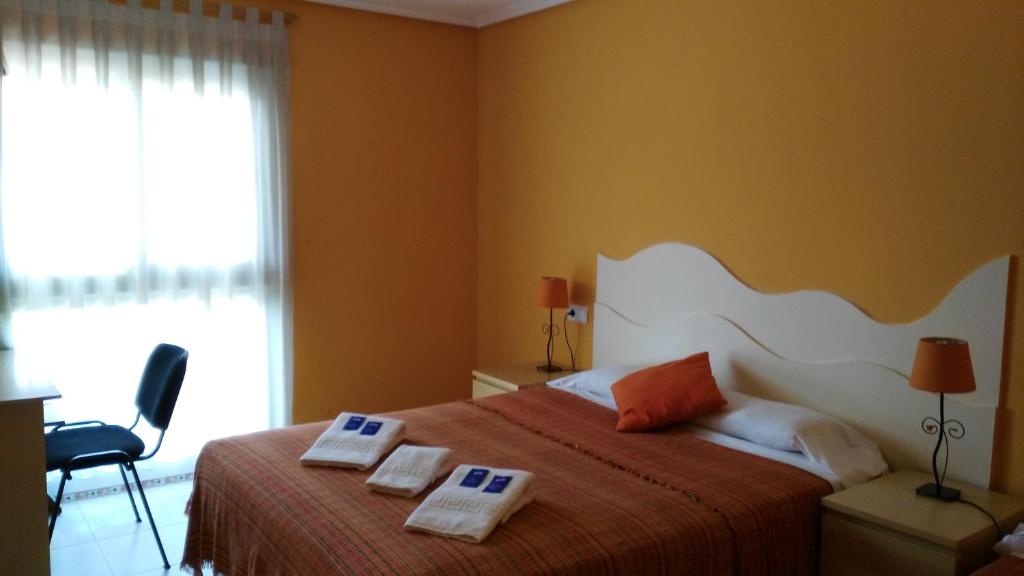 Postel nebo postele na pokoji v ubytování Costa HP