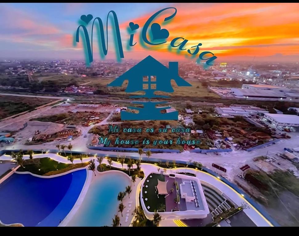 an aerial view of a resort with the words mitza the name of all at Azure North MiCasa in San Fernando