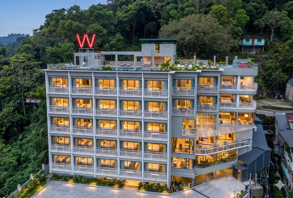 an aerial view of a hotel building with a x sign on top at Weekend Retreat- Hotel & Spa in Kurseong