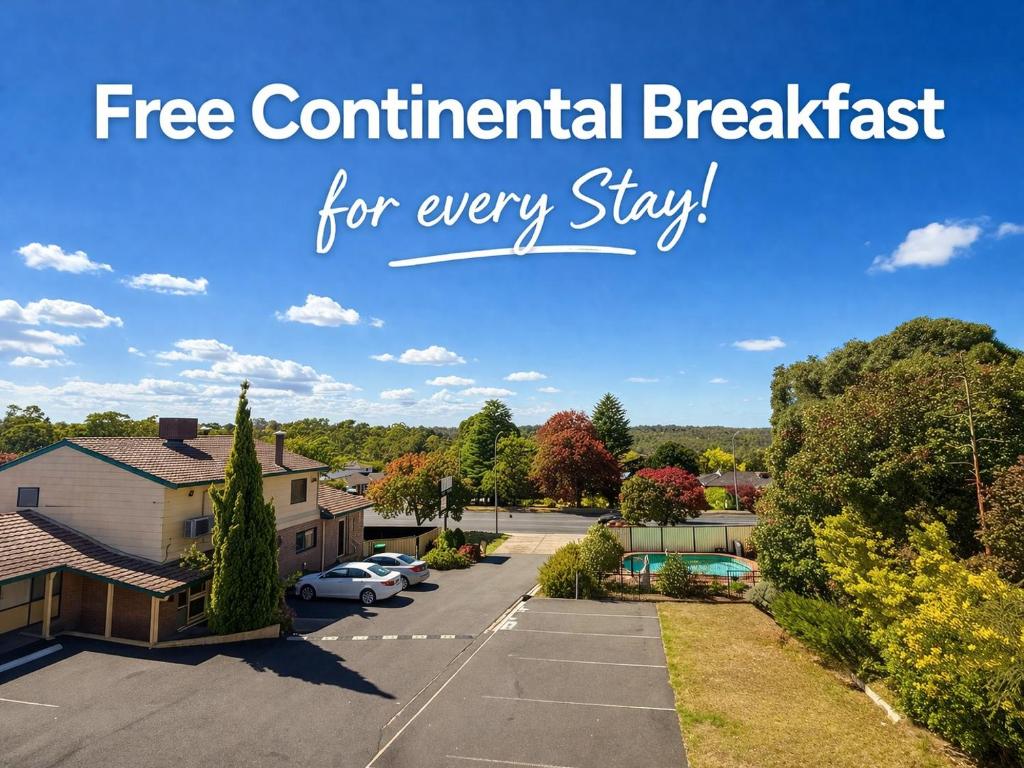 a sign that reads free continental breakfast for every stay at Hideaway Motor Inn in Armidale