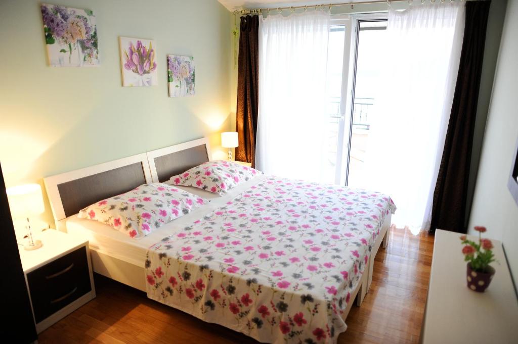 Postel nebo postele na pokoji v ubytování Apartments&Rooms Jelavić