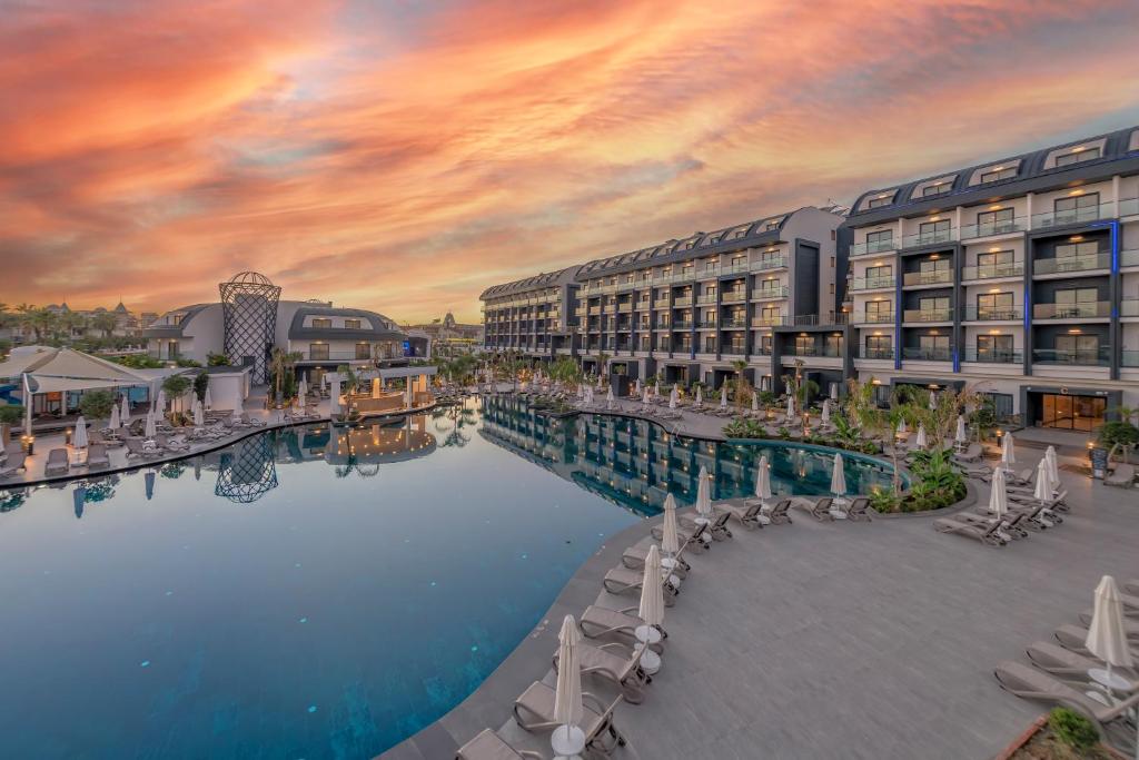 a rendering of a resort with a pool and buildings at Royal Atlantis Icon in Side