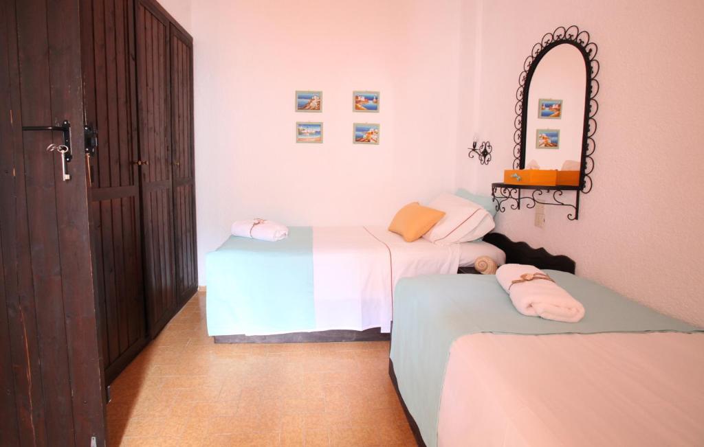Posteľ alebo postele v izbe v ubytovaní Elounda Relax Apartment