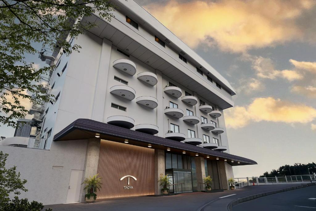 a building with balconies on the side of it at TAOYA Atami in Atami