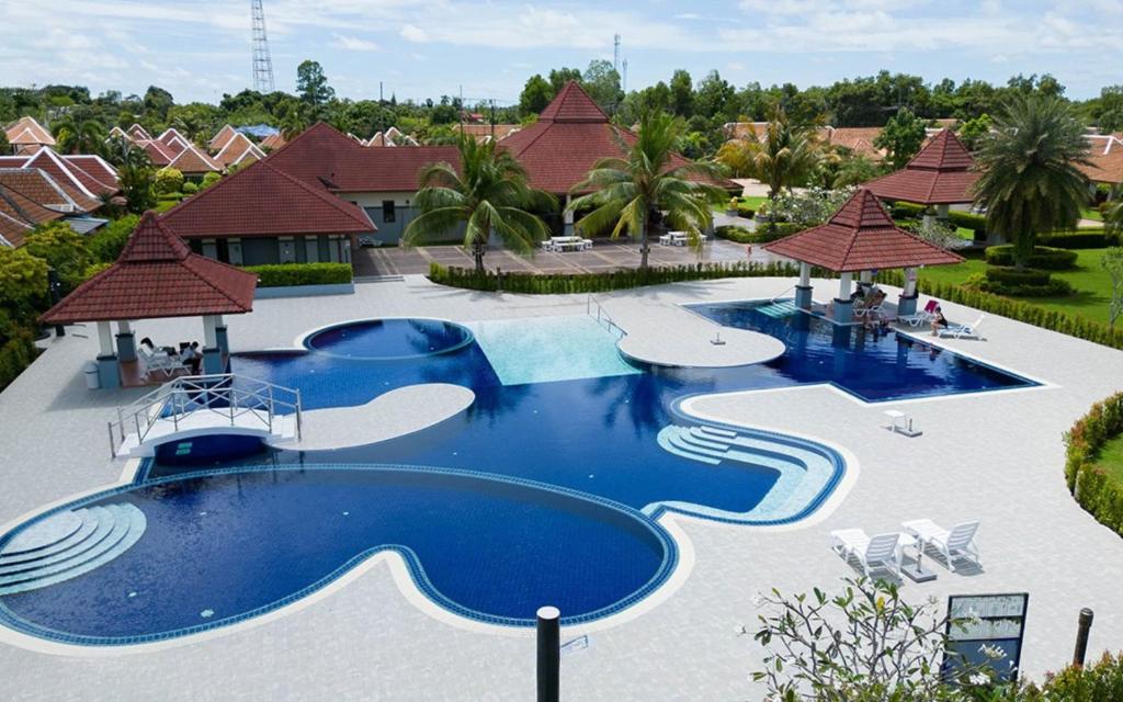 an overhead view of a pool at a resort at Garden Villa in Bali Residence Mae Phim with Kids Bunk Suite in Ban Bua Phut