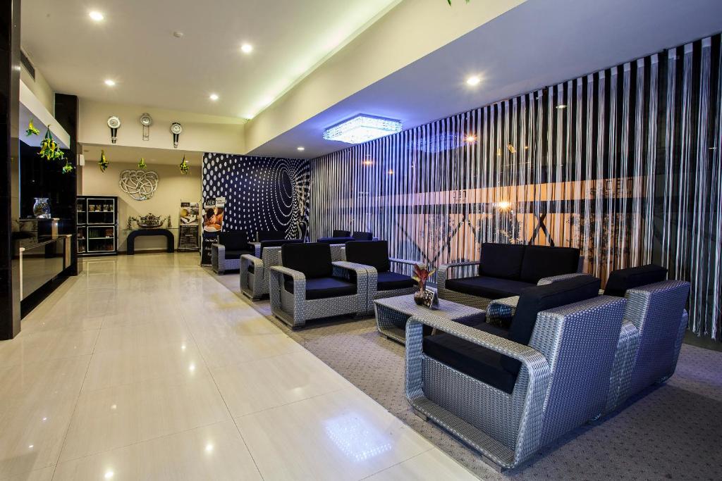 Posezení v ubytování Hotel Neo Palma Palangkaraya by ASTON