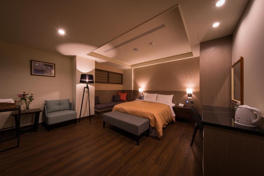 Postel nebo postele na pokoji v ubytování Sir Motel - Sanchong