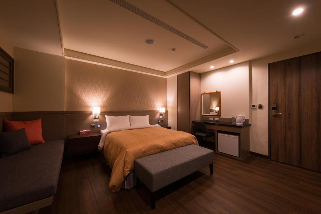 Postel nebo postele na pokoji v ubytování Sir Motel - Sanchong
