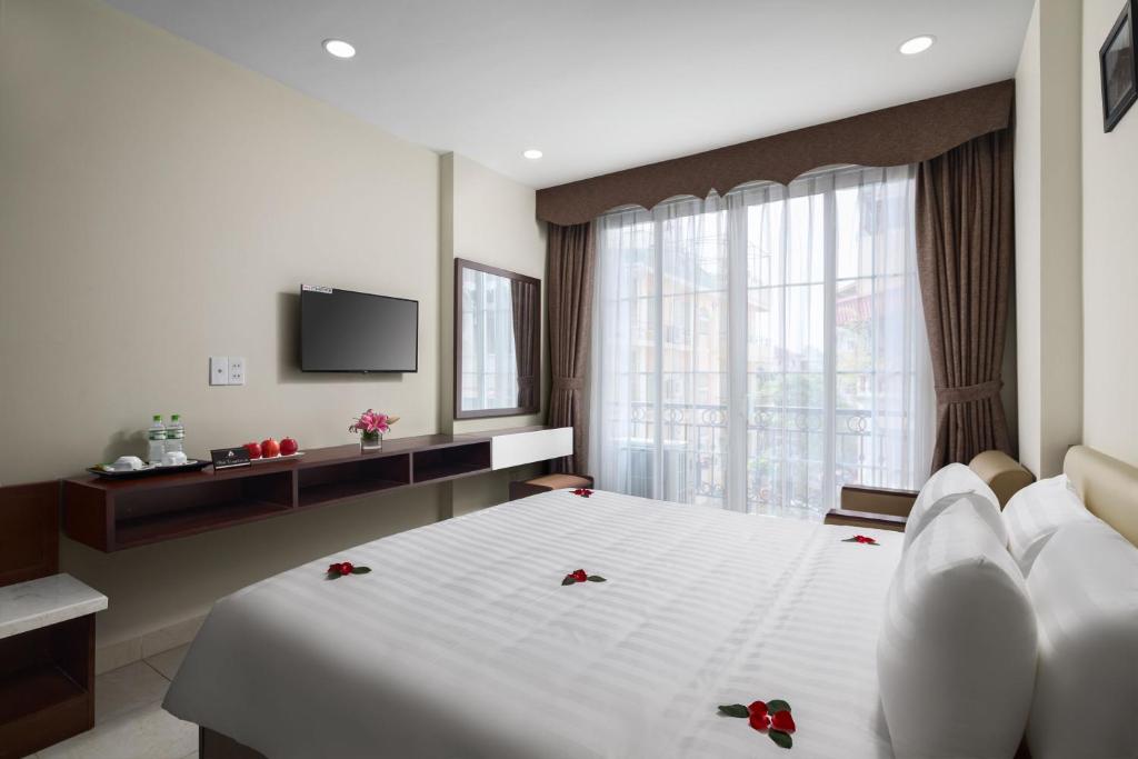 Postel nebo postele na pokoji v ubytování Dream Central Hotel & Spa - Hanoi Old Quarter