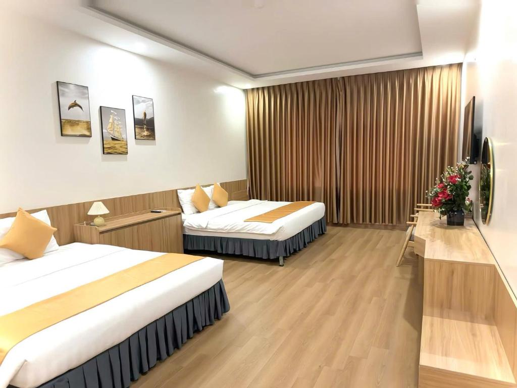 White Hotel Nghệ An - デラックス 4 人部屋
