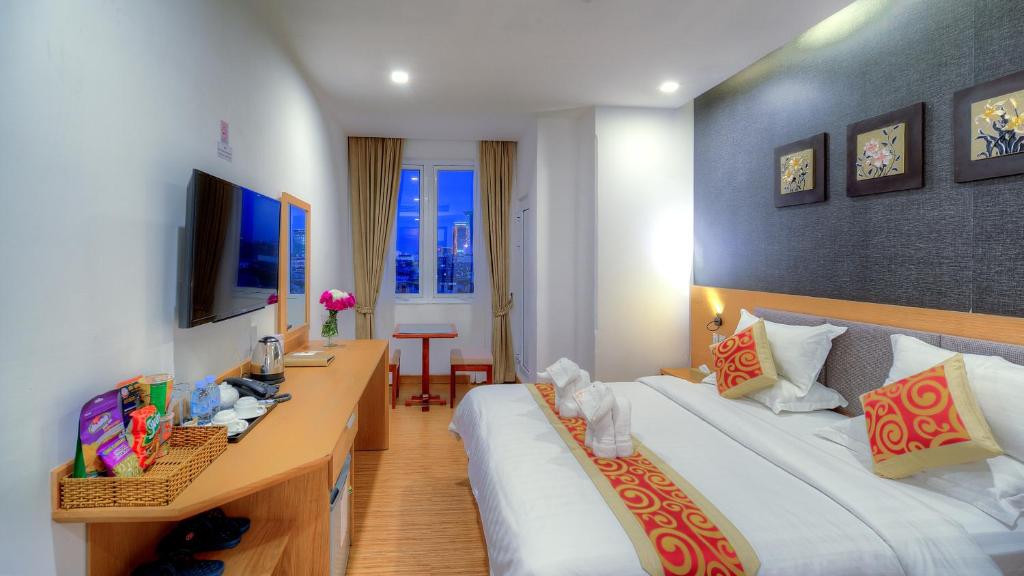 TV a/nebo společenská místnost v ubytování Orussey One Hotel & Apartment