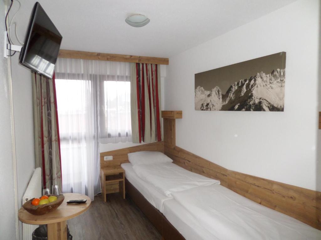 Letto o letti in una camera di Pension Rainer