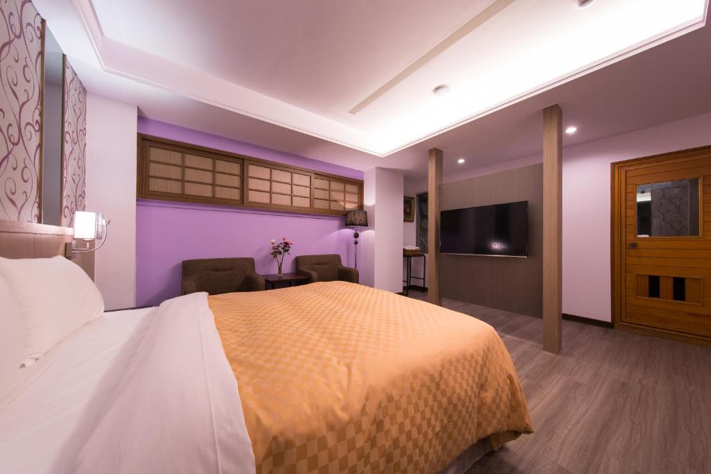 Postel nebo postele na pokoji v ubytování Sir Motel - Sanchong