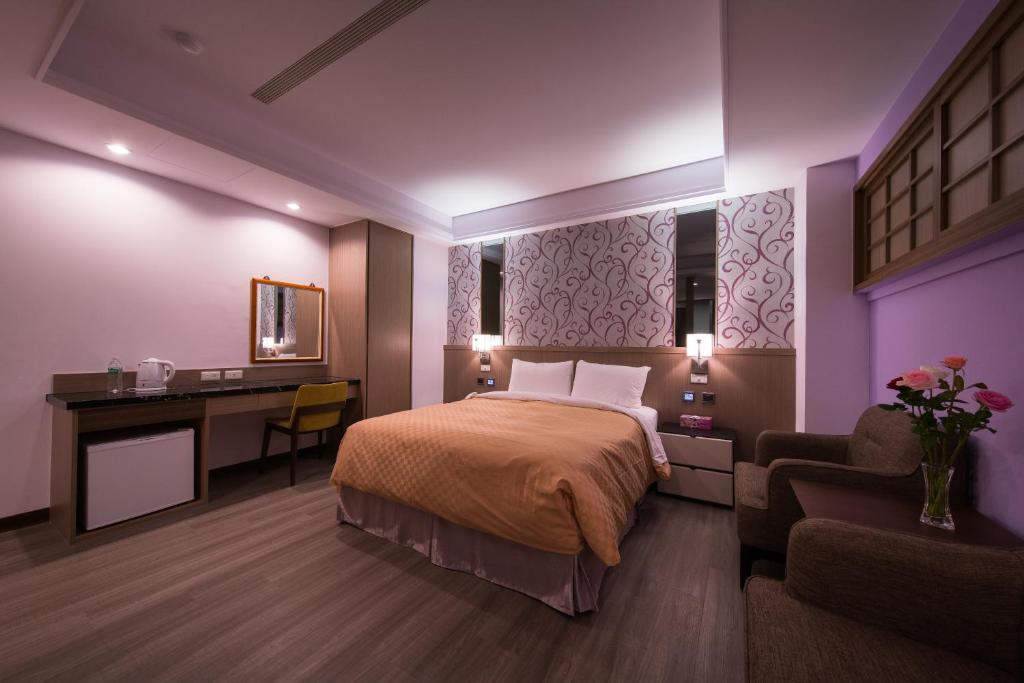 Postel nebo postele na pokoji v ubytování Sir Motel - Sanchong