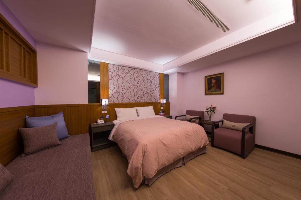 Postel nebo postele na pokoji v ubytování Sir Motel - Sanchong