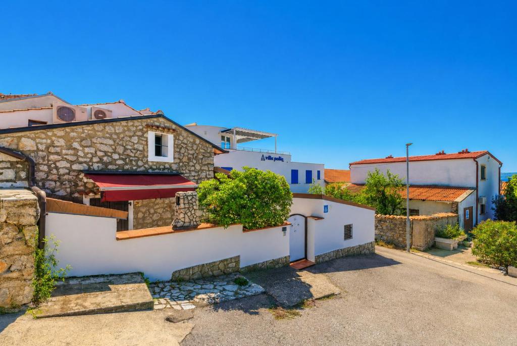 a villa with a view of the street at Bobbys Home in Selce