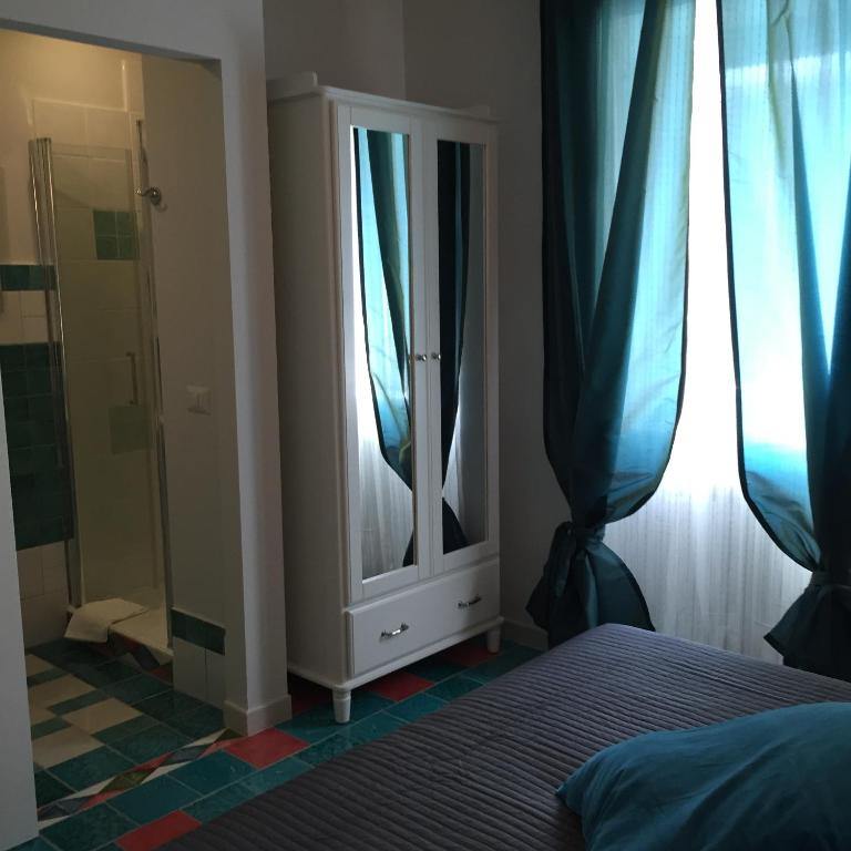 Postel nebo postele na pokoji v ubytování Via Roma 205