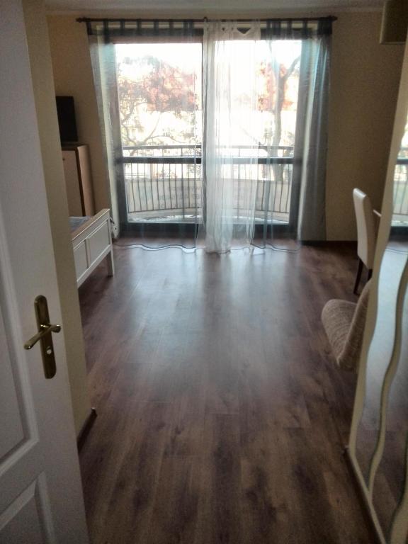 Posteľ alebo postele v izbe v ubytovaní Mikołajki Apartamenty Rynek