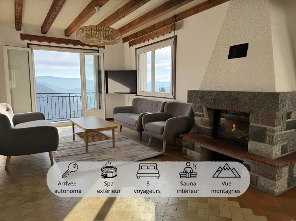 a living room with a couch and a fireplace at Le Repère De lAigle - Vue Panoramique in Cornimont
