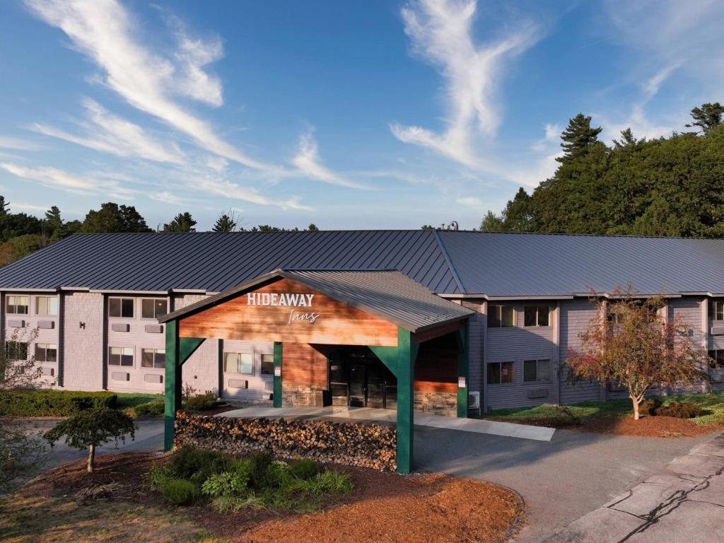an office building with a sign that reads the unity way at Hideaway Inn Mt Sunapee in Newbury