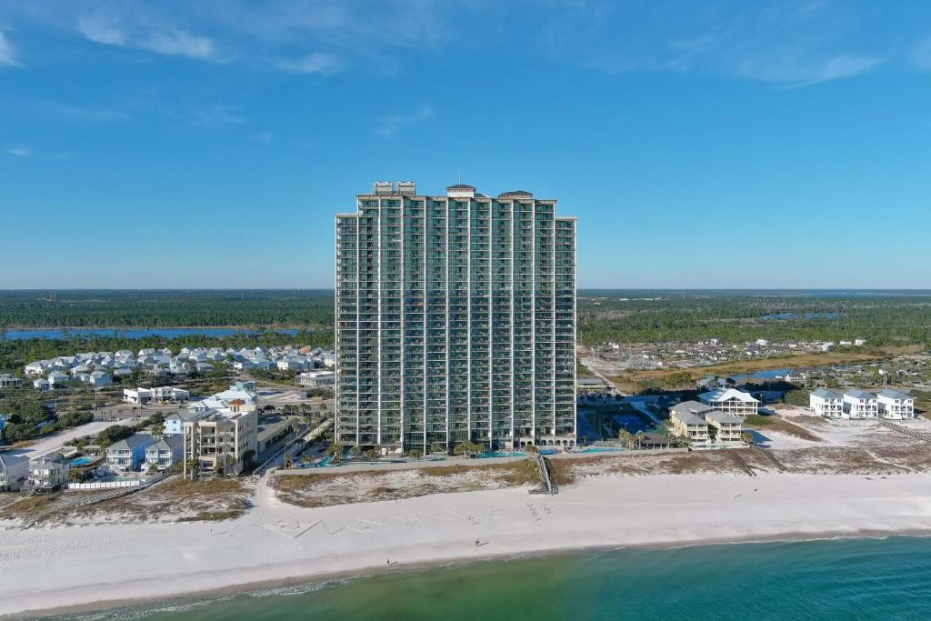 an aerial view of a large building next to the beach at The Oasis 805 in Orange Beach
