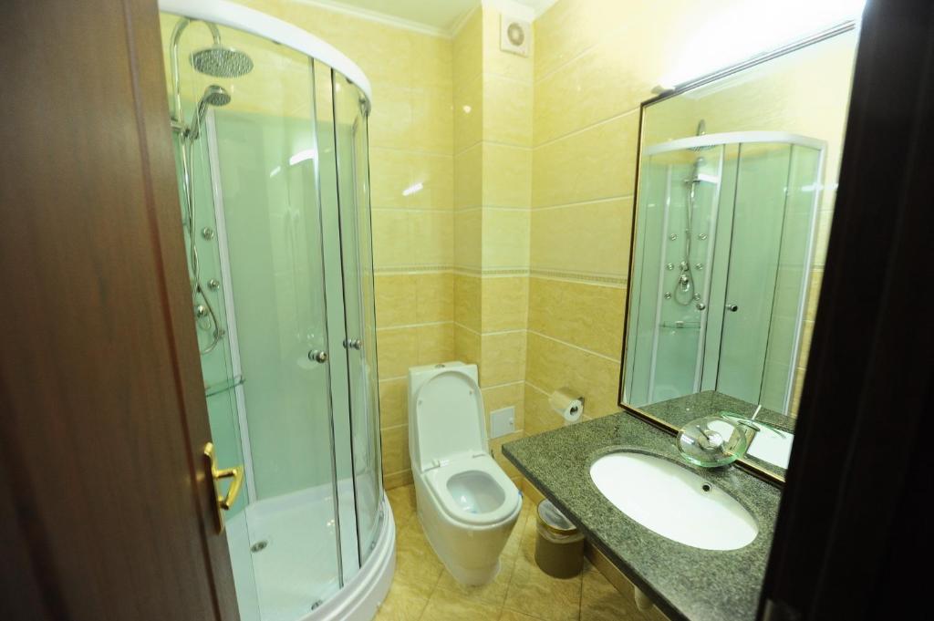 Koupelna v ubytování Hotel Mondial - Baia