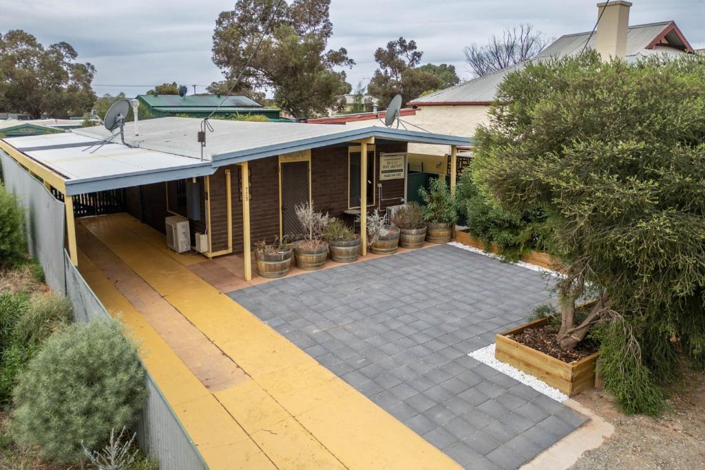 an aerial view of a house with a patio at Flinders Ranges Bed and Breakfast in Hawker