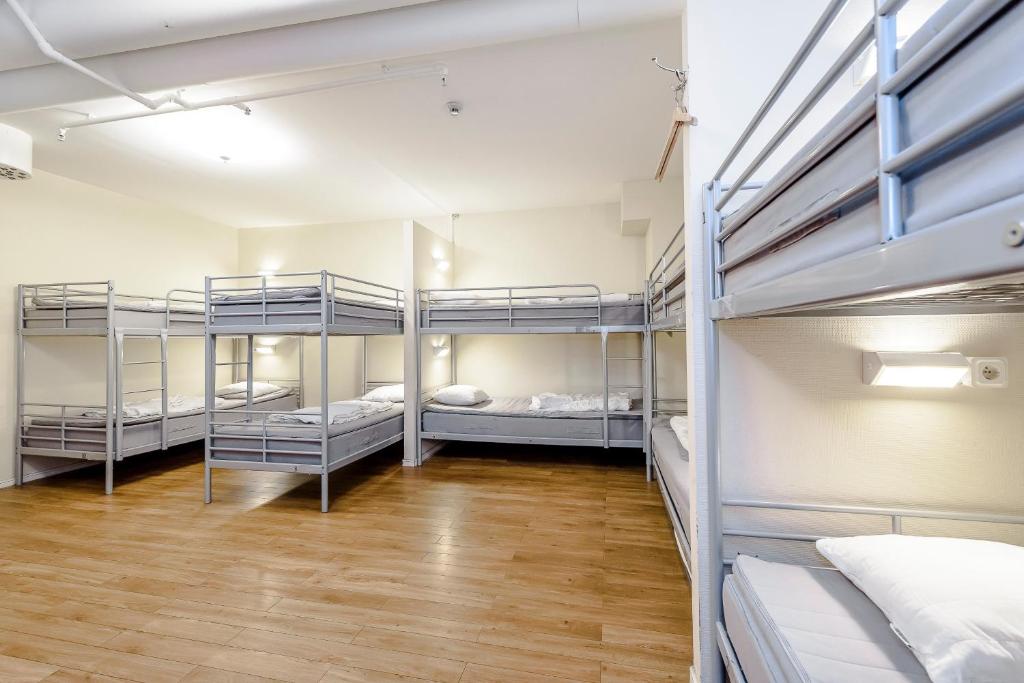 Postel nebo postele na pokoji v ubytování City Hostel