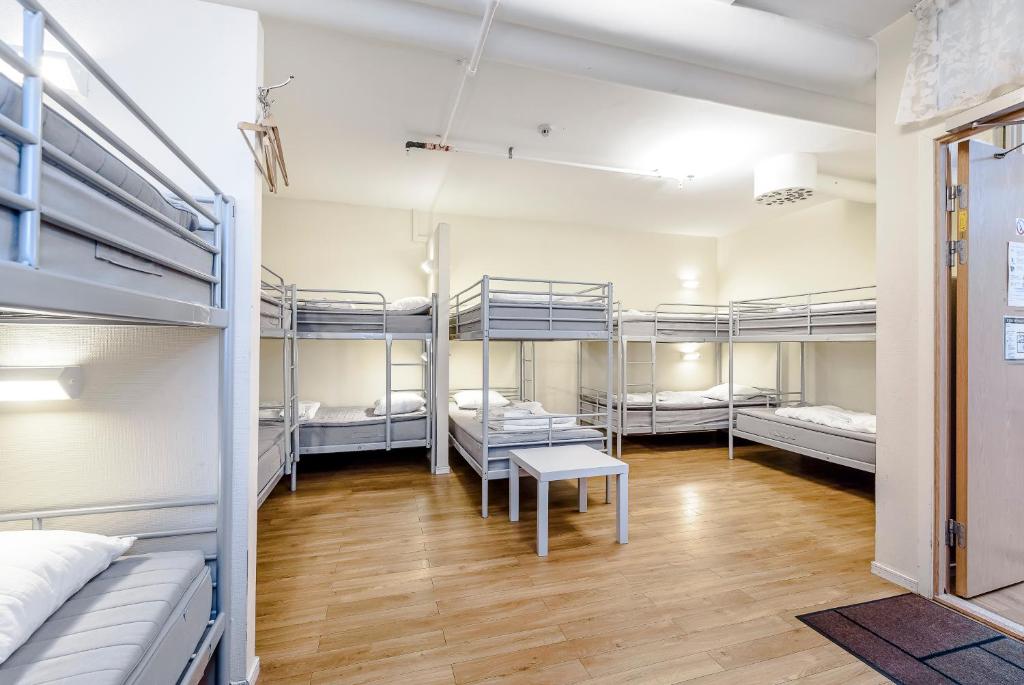 Postel nebo postele na pokoji v ubytování City Hostel