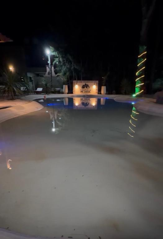 a blurry picture of a street at night at Complejo del Jaguel in Santa Teresita