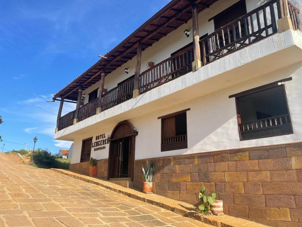 a building with balconies on the side of it at Hotel Lengerke Barichara in Barichara
