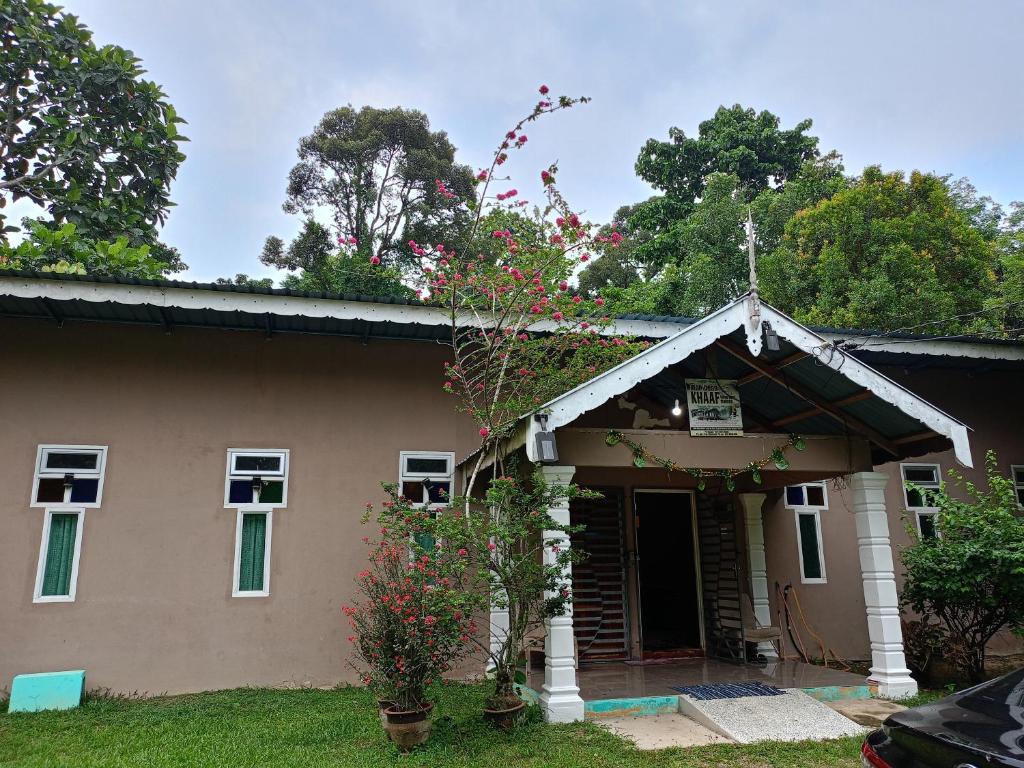 a house with a sign on the front of it at Anjung Afilia 1 in Kuala Kangsar