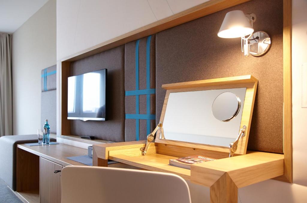 TV a/nebo společenská místnost v ubytování Strandgut Resort