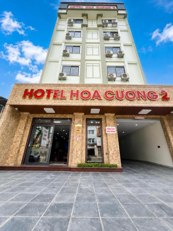 a hotel hora queuing sign in front of a building at Hoa Cương Hotel 2- Hà Giang in Ha Giang