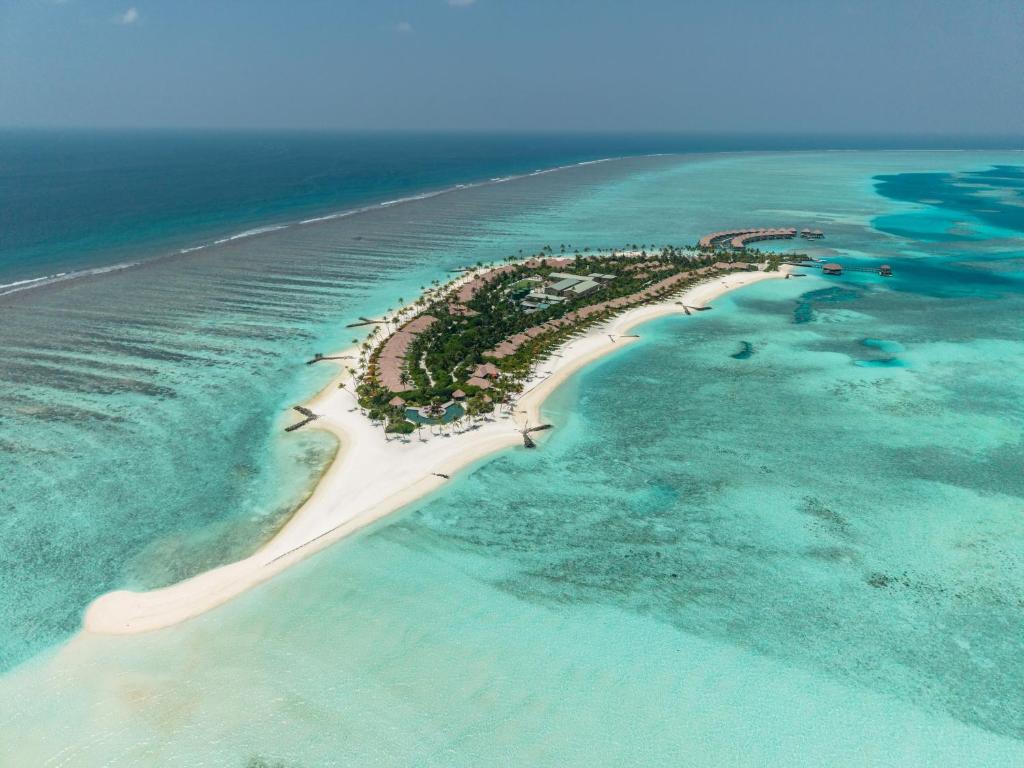 an aerial view of an island in the ocean at Meliá Whale Lagoon Maldivas in Fenfushi