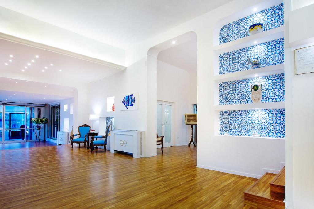 Posezení v ubytování Aequa Hotel