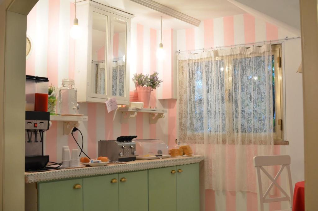 Kuchyň nebo kuchyňský kout v ubytování Hotel Tre Stelle