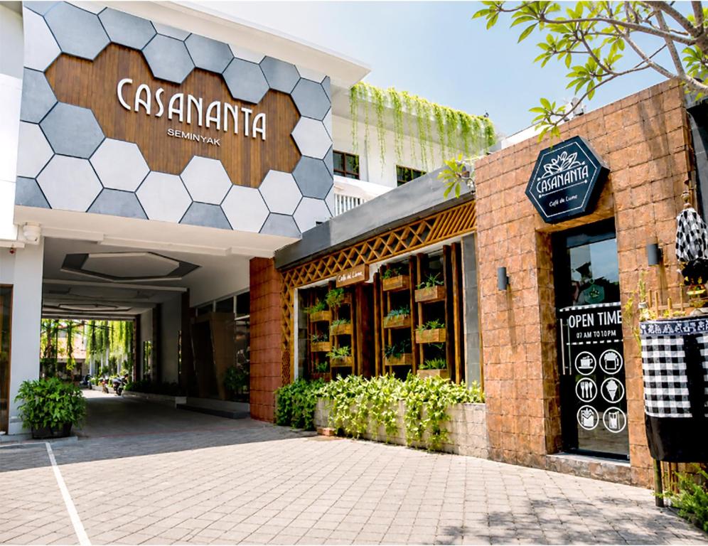 a store front of a restaurant with a sign on it at Casananta Seminyak in Seminyak