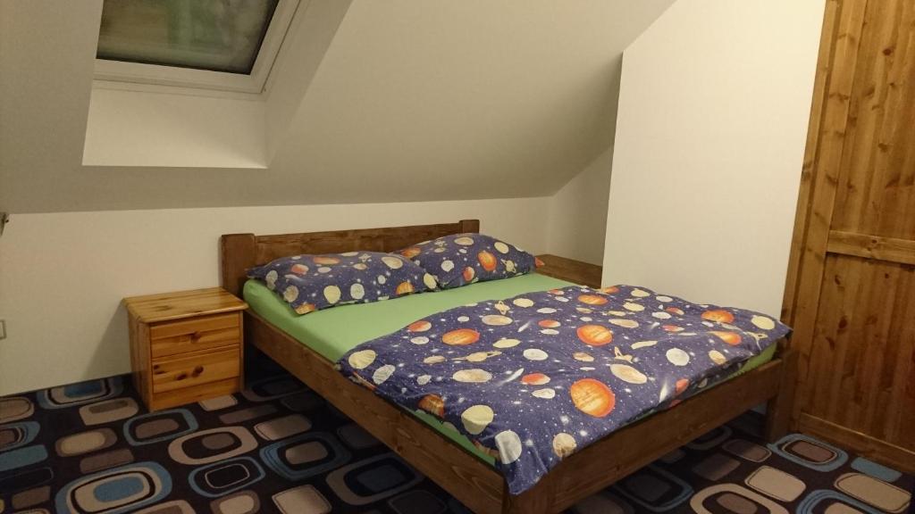 Postel nebo postele na pokoji v ubytování Penzion Krkonoše