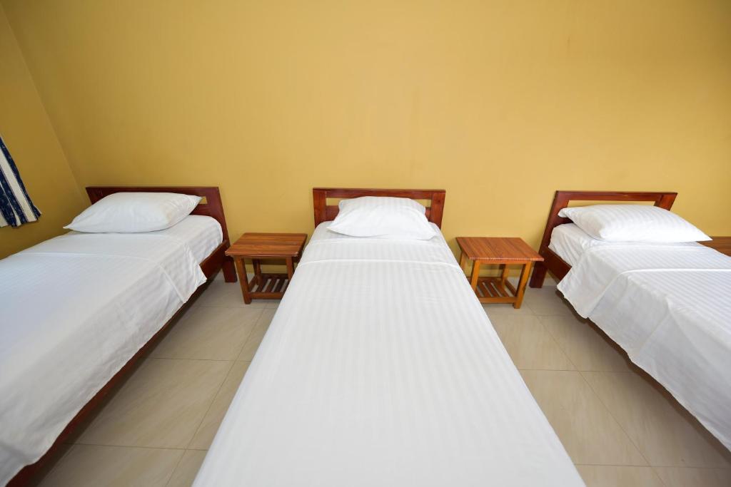 Postel nebo postele na pokoji v ubytování Hotel La Aldea