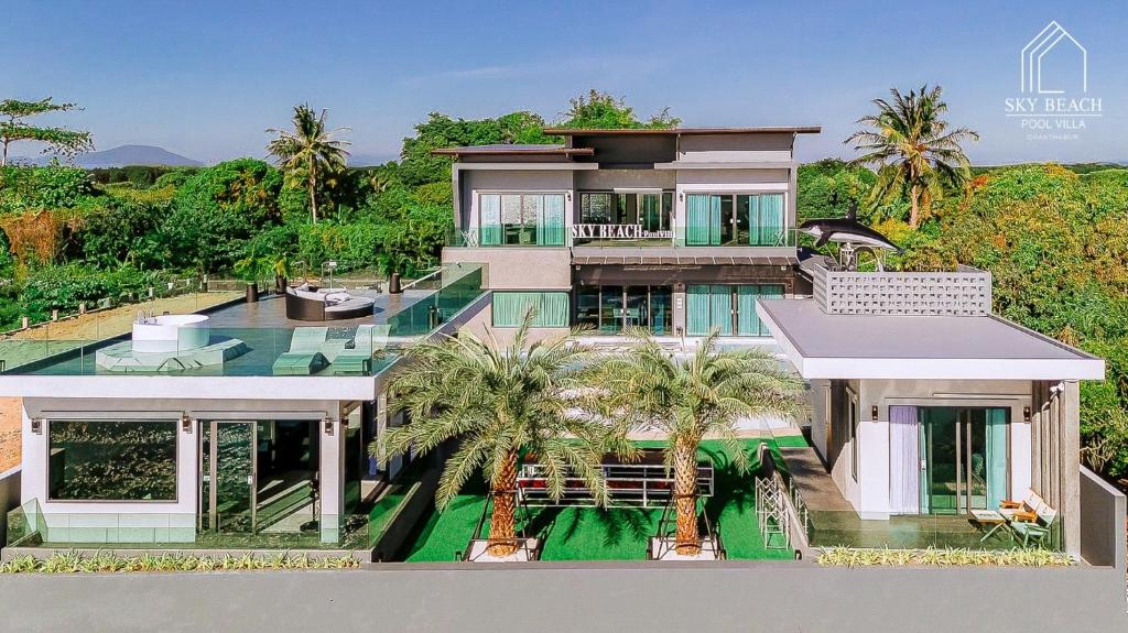 an aerial view of a house with palm trees at Sky Beach Pool Villa Chanthaburi 2 in Laem Sing