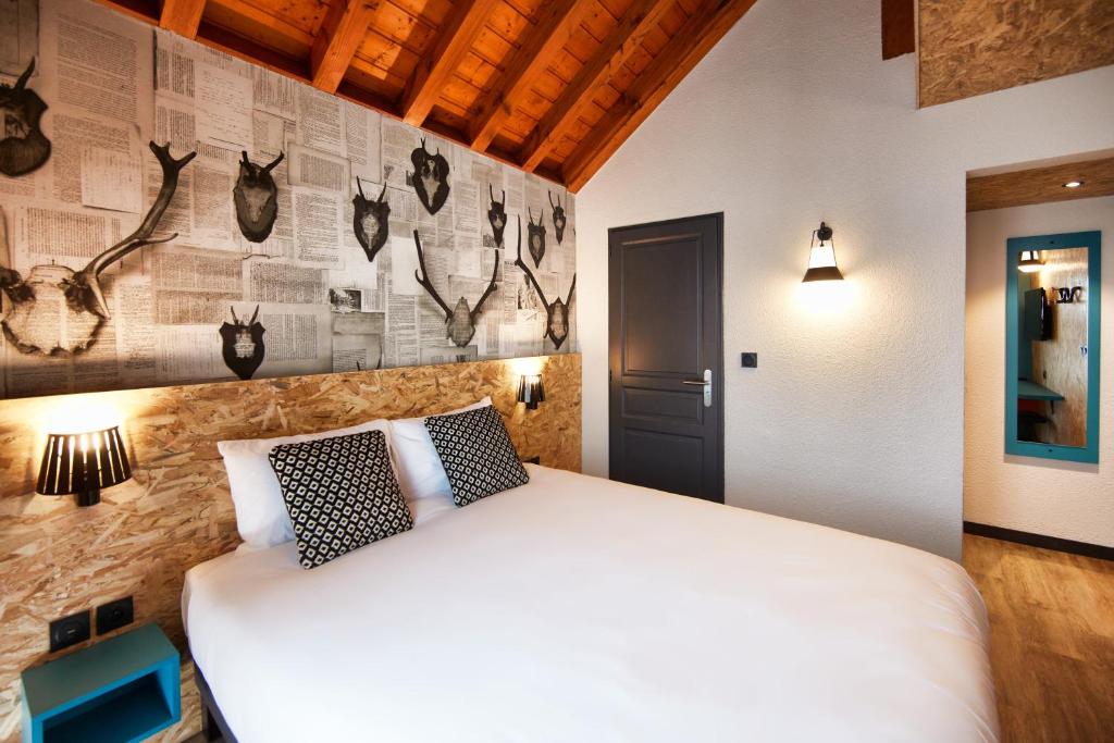 Postel nebo postele na pokoji v ubytování Moontain Hostel