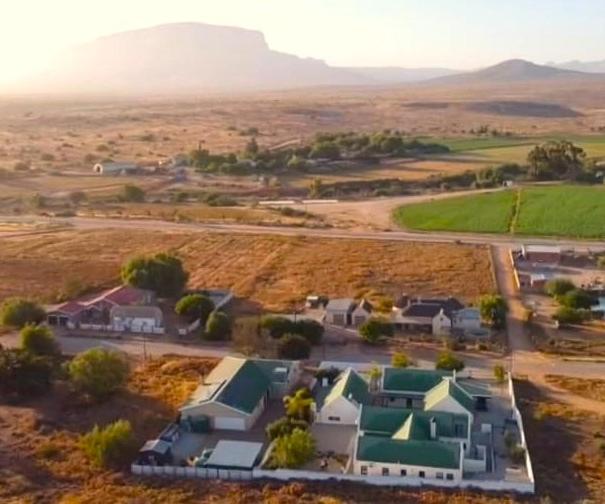 an aerial view of a house in the desert at Aant Dorpseind in Vanrhynsdorp