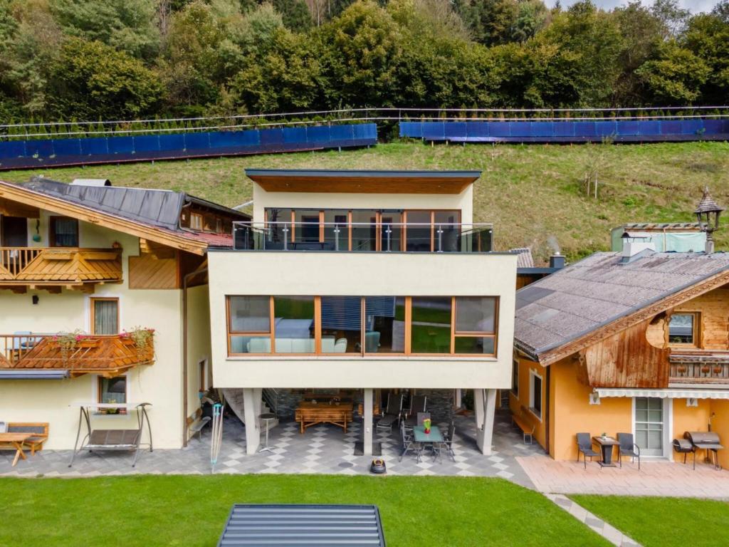 an aerial view of a house with a yard at Chalet in Stuhlfelden near Ski Slopes in Stuhlfelden